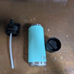 YETI Turquoise Tumbler with Straw And Hotshot Lid.